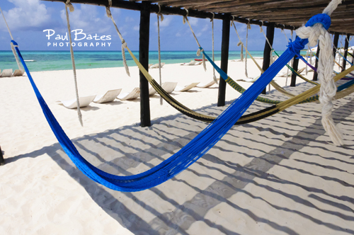 Free Picture: Photo of empty colorful hammocks waiting for visitors to enjoy under a shady pergola on the beach in Cozumel, Mexico.