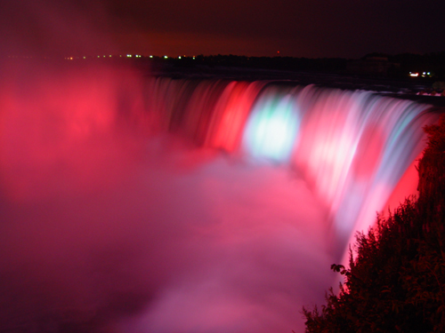 Free Picture: Photo of Horseshoe Falls at Niagara Falls illuminated with red and blue spotlights.