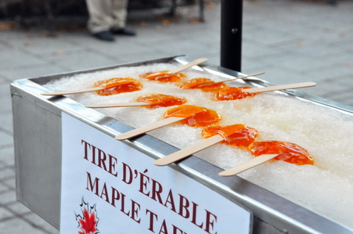 Free Picture: Photo of maple taffy also called tire d'erable by Canadians poured onto man made snow and then wrapped around popsicle sticks to be enjoyed by kids of all ages.