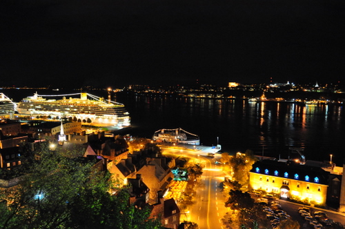 Free Picture: Photo of the night lights at the edge of Quebec City and Levis as a cruise ship docks on the St. Lawrence River and the ferries make their way across.