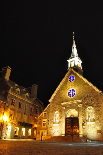 Free Picture: Photo of Notre Dame des Victoires church in Vieux Quebec or Old Quebec glowing at night.